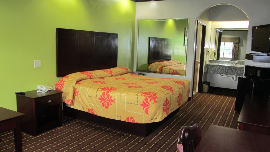 Palace Inn Хьюстон Номер фото